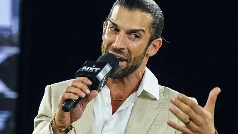 Robert Stone holding a microphone