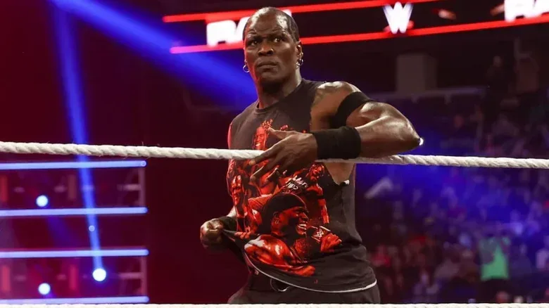 R-Truth looks to step in the ring, a worried expression on his face, before a match against GUNTHER on a December 2025 edition of "WWE Raw."