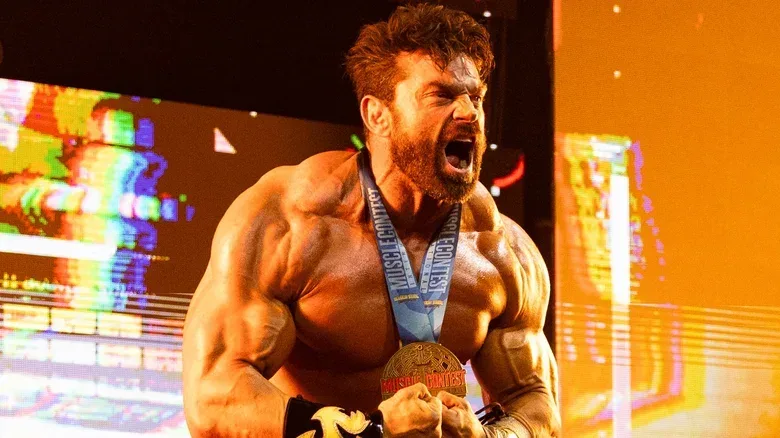 Brian Cage flexing on his way to the ring for a match against Hechicero on "AEW Collision," August 2026.