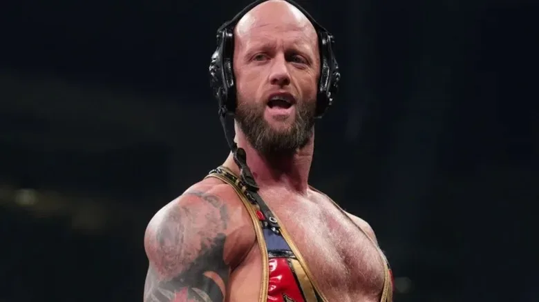 Josh Alexander stands in the ring, ready for a match, on an episode of AEW programming.