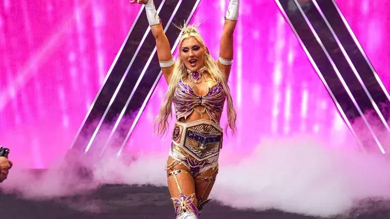 Then-Women's United States Champion Tiffany Stratton makes her way down to the ring, belt around her waist, to compete in the interim WWE Women's Championship ladder match at WWE S