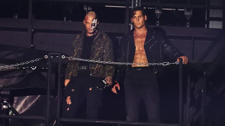 Steven Borden stands alongside Darby Allin in the rafters of an arena, looking down to the ring, on the September 23, 2026 edition of "AEW Dynamite."