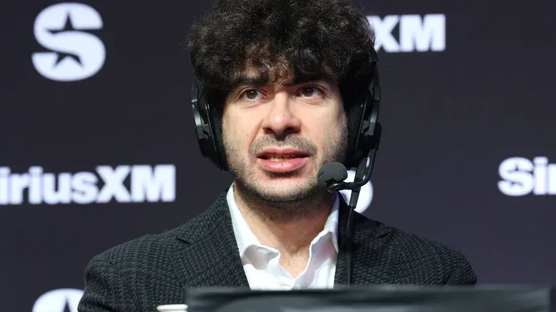 Tony Khan wearing a headset