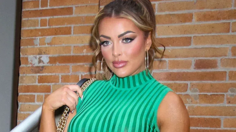 Mandy Rose wearing hoop earrings