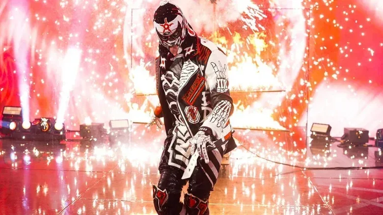 Penta poses as he struts down the ramp before a segment on "WWE Raw."