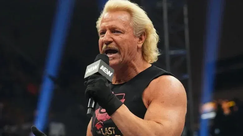 Jeff Jarrett holding a microphone