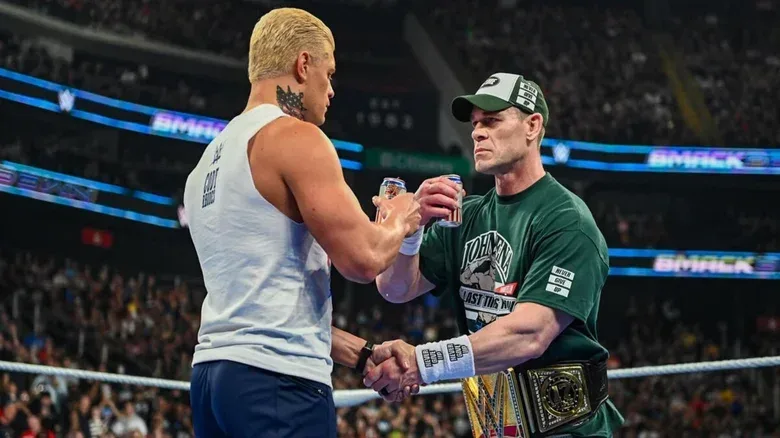 Cody Rhodes and then-Undisputed WWE Champion John Cena share a beer in the middle of the ring on the August 1, 2025 edition of "WWE SmackDown" following Cena's face turn ahead of W