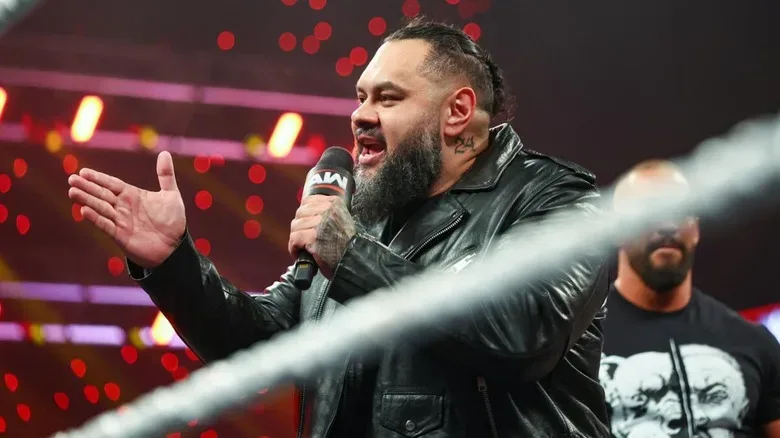 The Vision's Bronson Reed cuts a promo in the ring, Bron Breakker in the background, during a September 2026 edition of "WWE Raw."