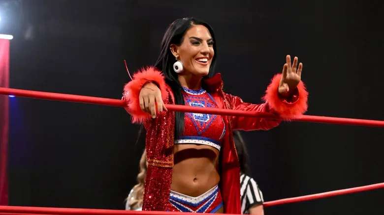 Tessa Blanchard waves to a fan