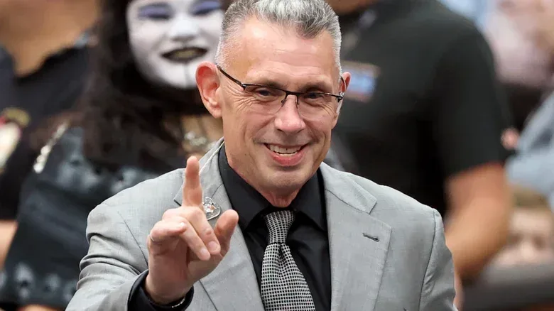 Michael Cole wearing glasses