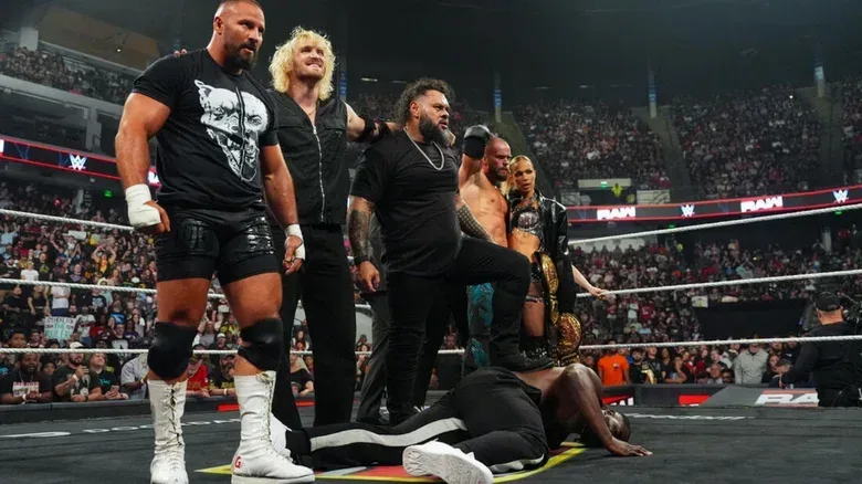 The Vision stand tall over a fallen Oba Femi, with Bronson Reed putting his foot on the back of the star, during the September 7, 2026 edition of "WWE Raw."