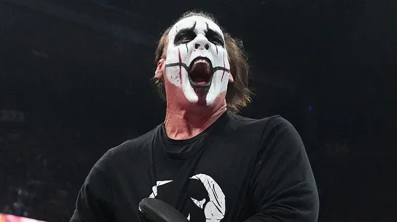 Sting during a match in AEW, locking in the Scorpion Death Lock.